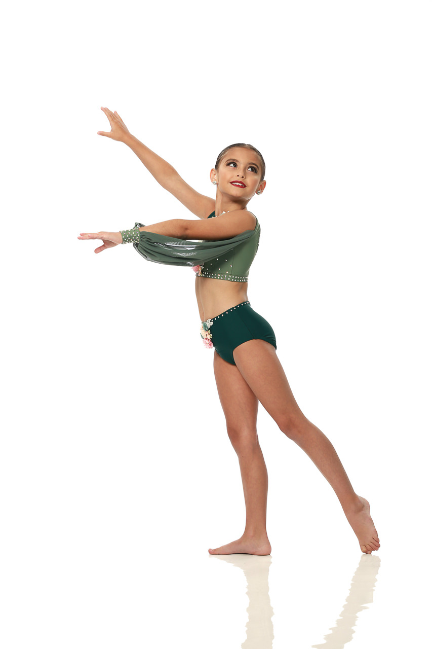 Young female dancer in olive green dance costume poses for dance recital photography in Exulting Images’ Fort Mill SC studio