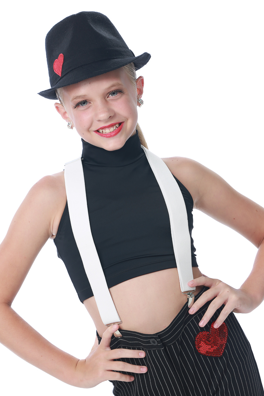 Young female dancer in pinstripe costume with white suspenders and a black fedora poses for dance recital photography in Exulting Images’ Fort Mill SC studio