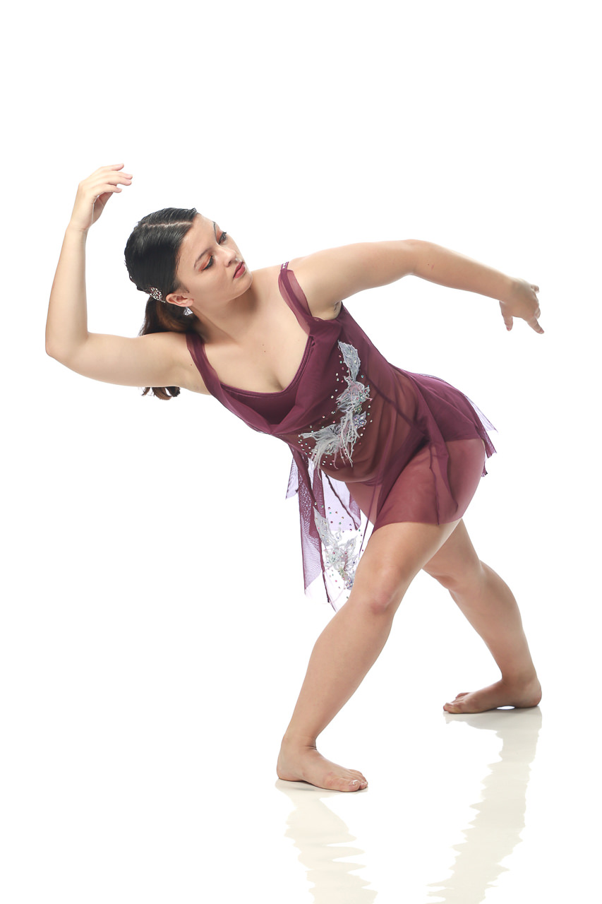 Barefoot female dancer poses for dance recital photography in Exulting Images’ Fort Mill SC studio