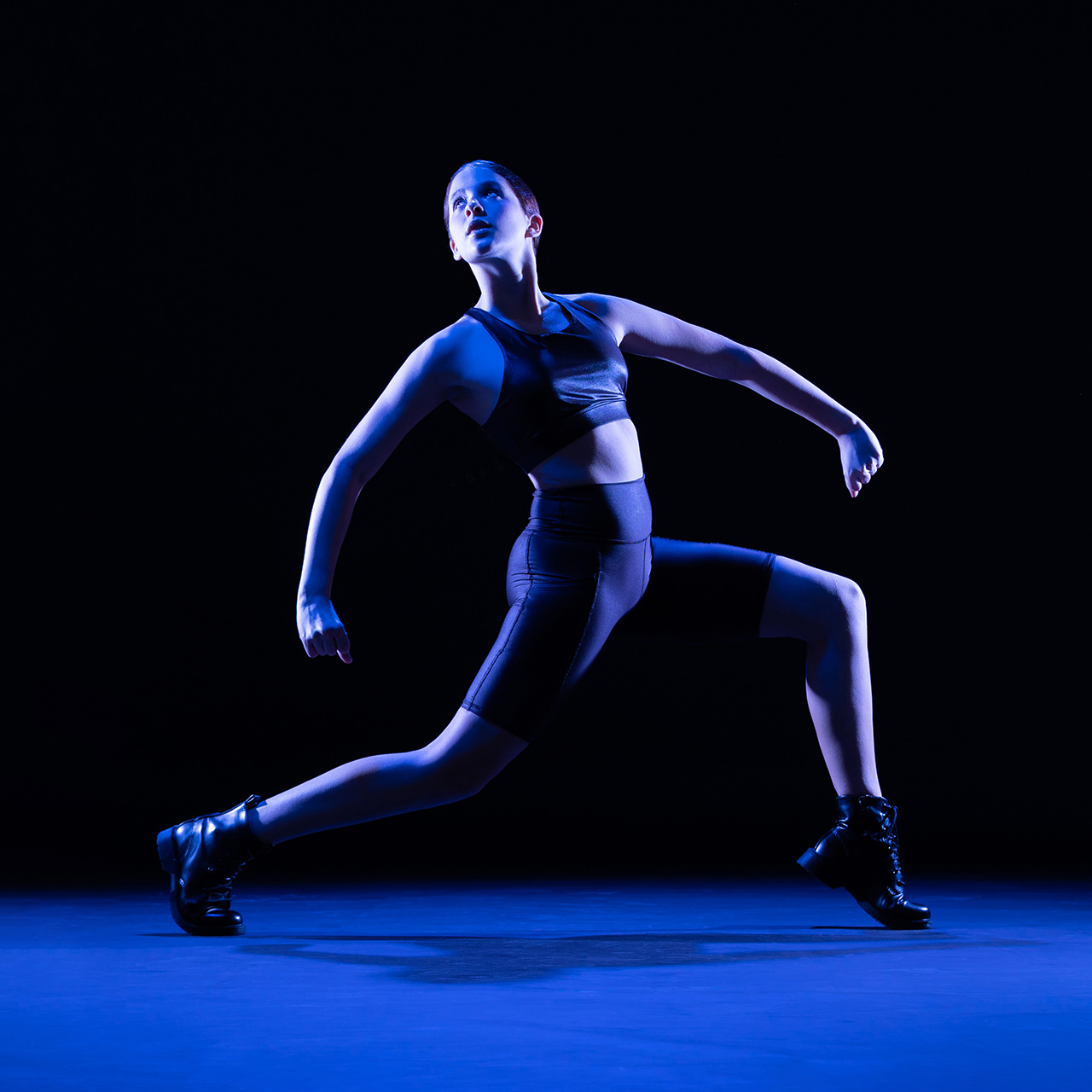 Dancer poses for modern dance photography in Exulting Images’ Fort Mill, SC studio