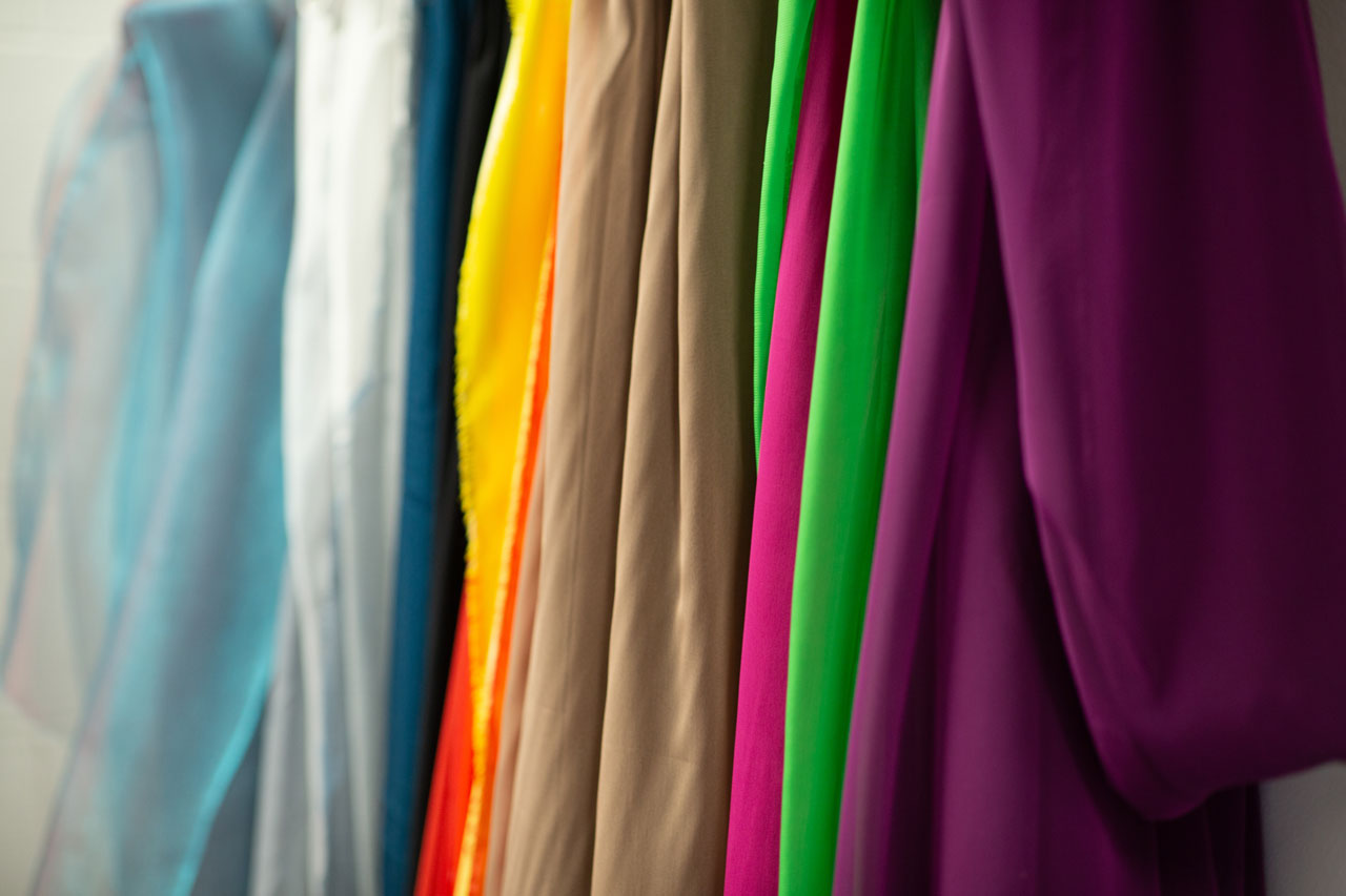 Multi-colored pieces of fabric in Exulting Image’s Fort Mill, SC dance photography studio