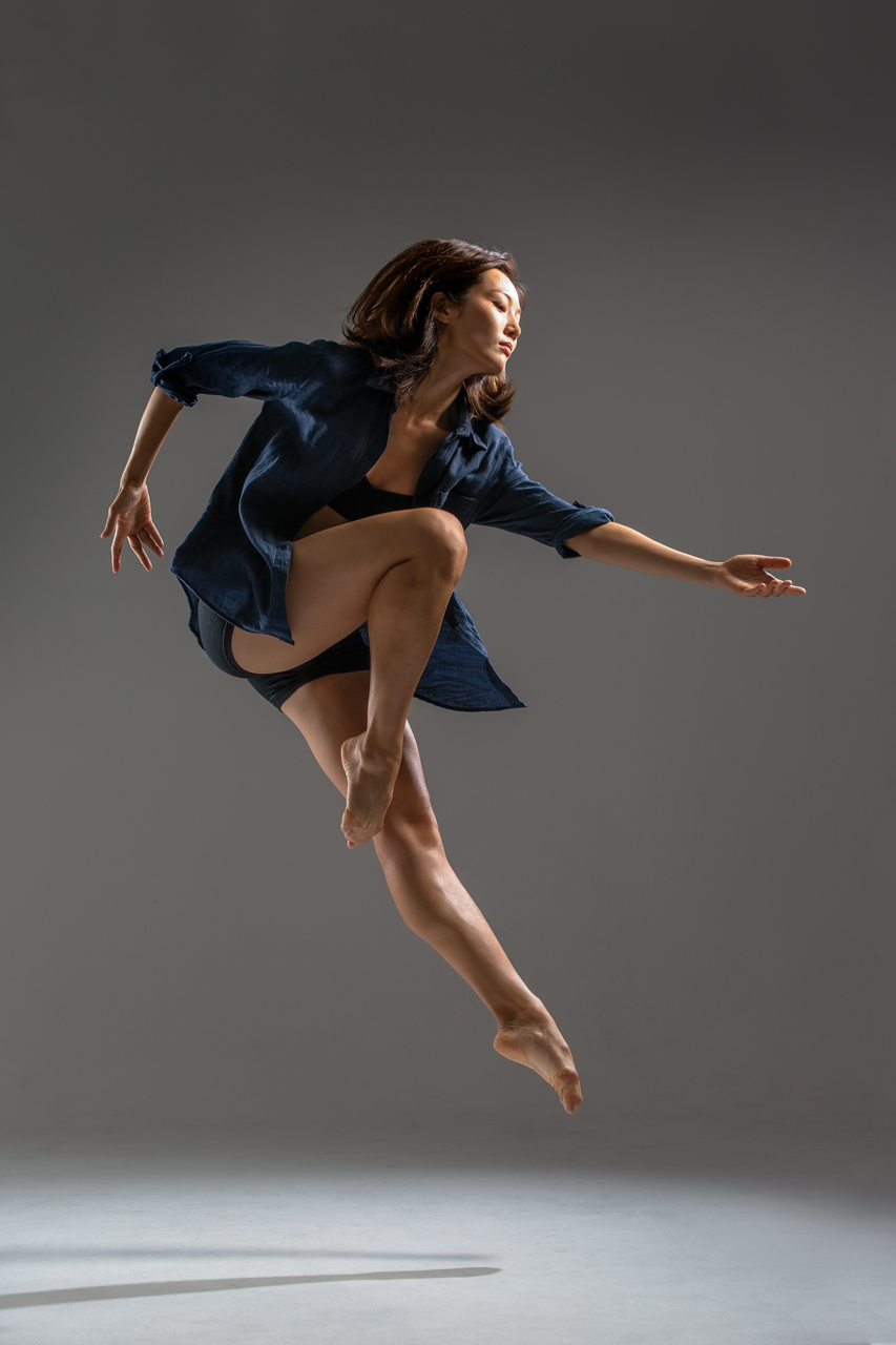Dance action shot of female in blue button down blouse at Exulting Images Fort Mill, SC studio